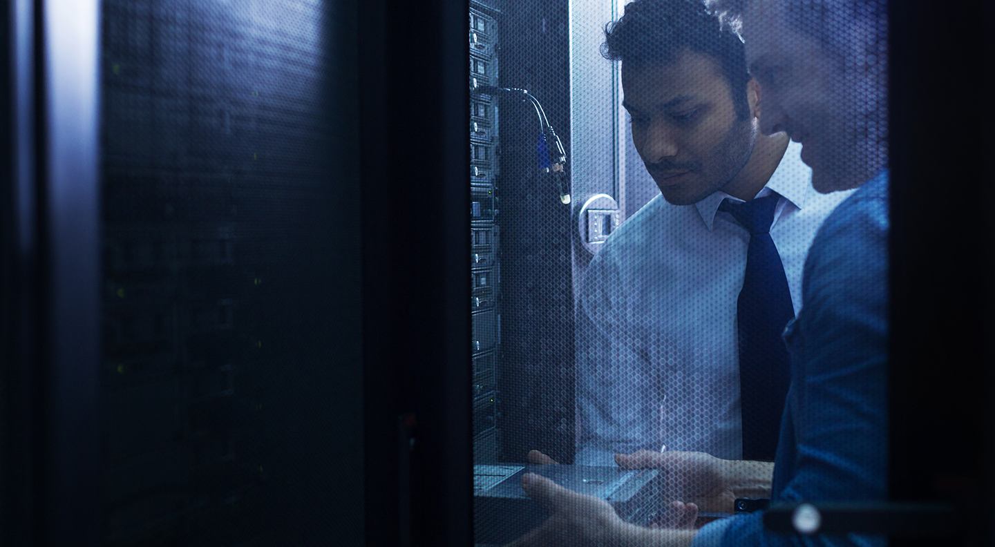 Handsome-male-technicians-working-in-the-server-room