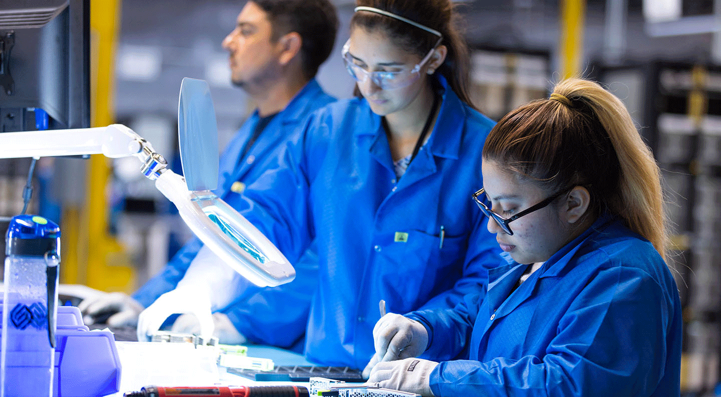 employees processing microchips