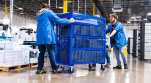 employees securely transporting parts harvested