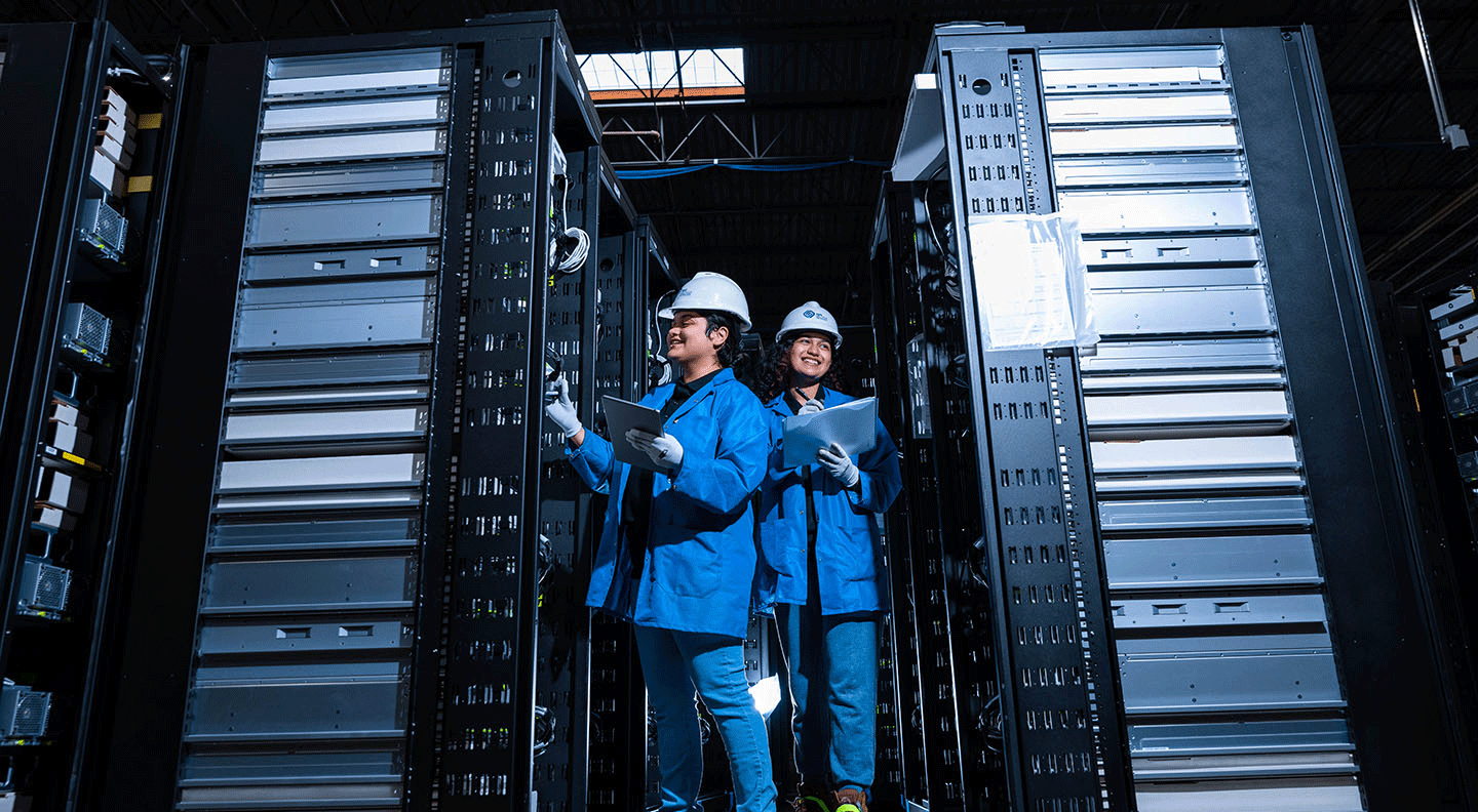 two employees tracking servers in circular center